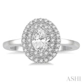 1/2 ctw Oval Cut Center Stone and Round Cut Diamond 1/3 ctw Ladies Engagement Ring in 14K White Gold